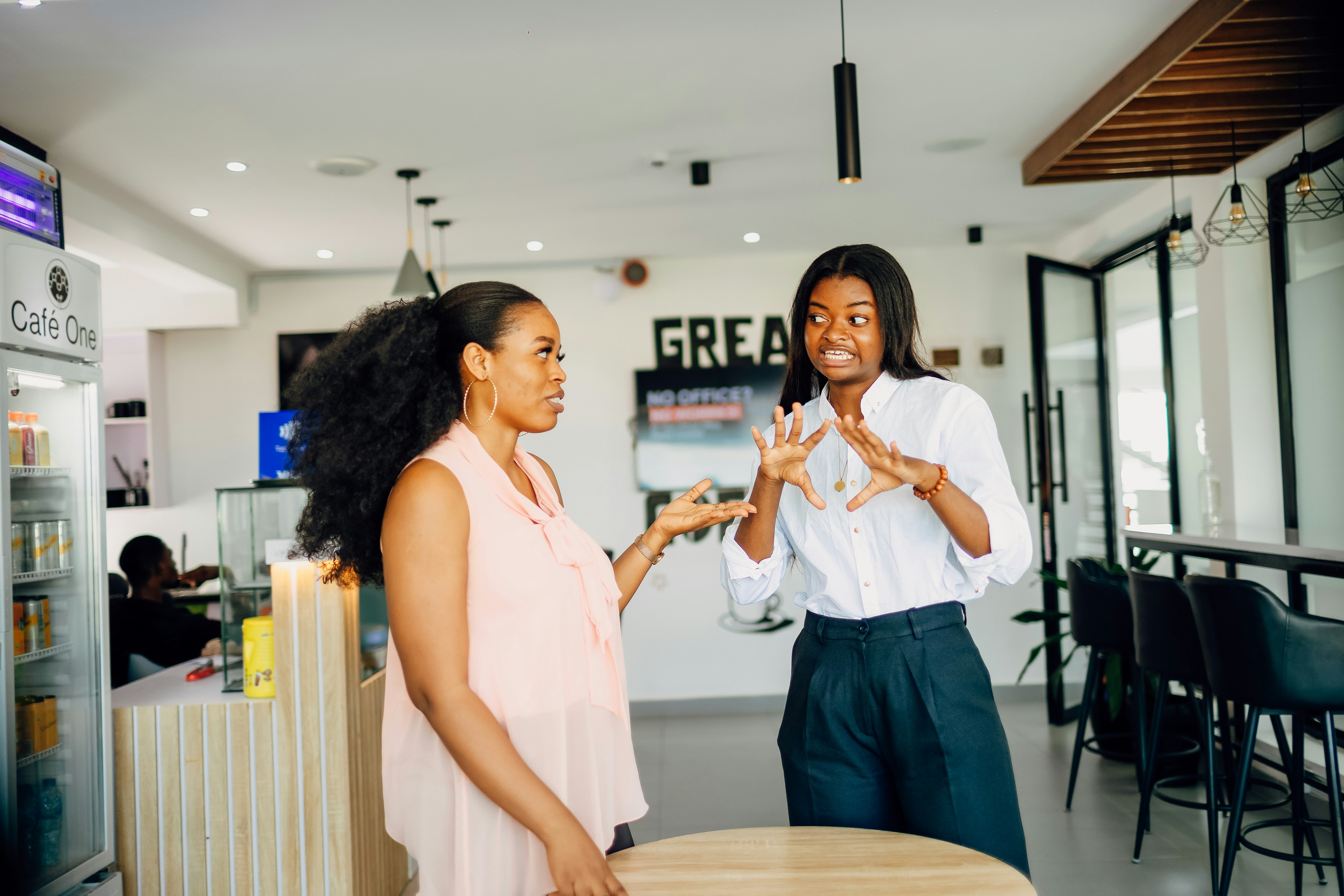 two co-workers discussing their assessment results
